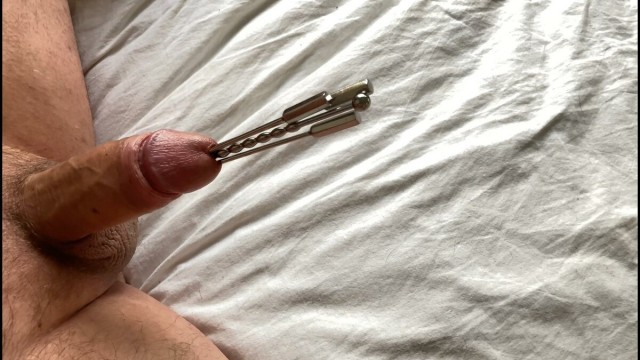 Extreme urethral sounding + cum. Hard oiled cock stuffed full. Multiple sounds and dilators in cock.