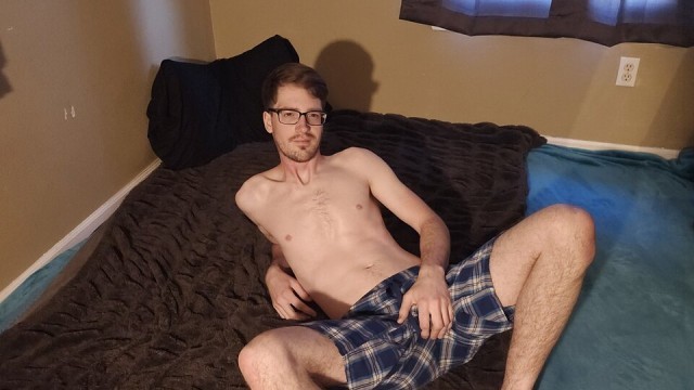 Nerdy short haired twink jerking fat cock